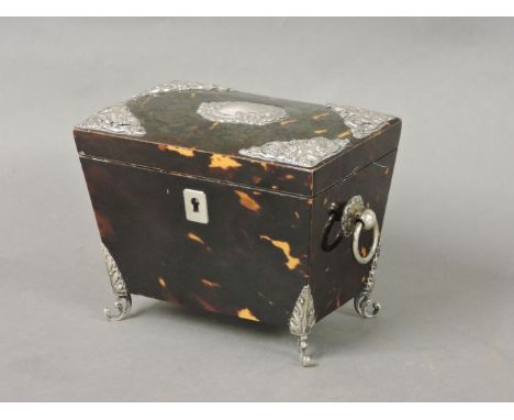 A tortoiseshell and silver mounted sarcophagus shaped tea caddy, 14cm wide