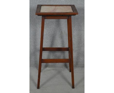 A late 19th century oak lamp table with marble top on square section stretchered supports. H.77 L.38 W.38cm 