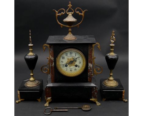 A late 19th century French slate and marble mantel clock with ormolu mounts, the ceramic face marked A la Gerbe d'Or raised o
