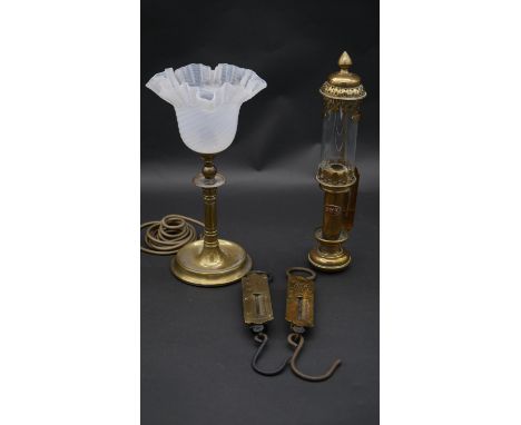 A vintage brass table lamp, a railwayman's storm lantern marked GWR and two brass spring scales. H.34.5cm (Tallest) 