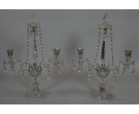 A pair of vintage twin branch table candelabras in glass and with cut crystal drops. H.49cm 