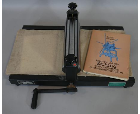 A Tofko Danish Norup Mini lithograph print makers press, with retailers label and book 'The Parctical guide to Etching by Man