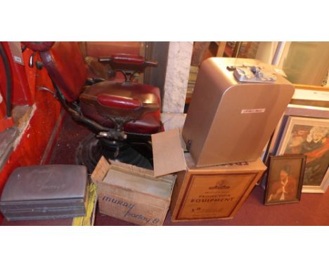 A Bell and Howell projector together with other related items 