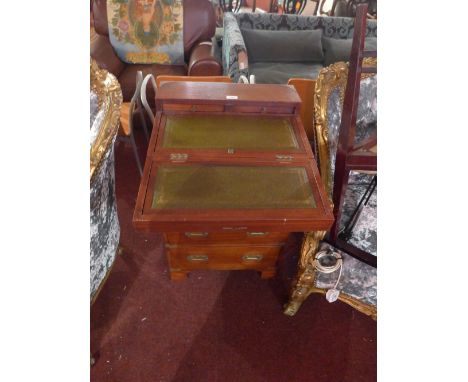 A mahogany brass bound campaign chest fitted fall front above four drawers on bracket feet