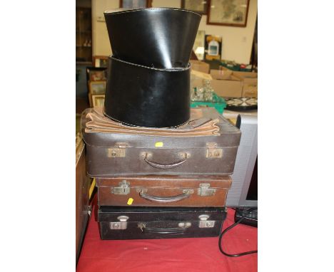 THREE VINTAGE SUITCASES AND A WIG BOX