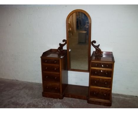 A MAHOGANY ANTIQUE TWIN PEDESTAL DRESSING TABLE