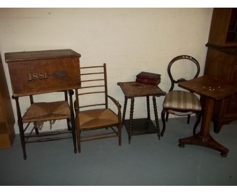 A SELECTION OF SEVEN ITEMS TO INCLUDE A DEORGIAN TILT TOP PEDESTAL TABLE, THREE CHAIRS, A PINE STORAGE BOX AND A CARVED SIDE 