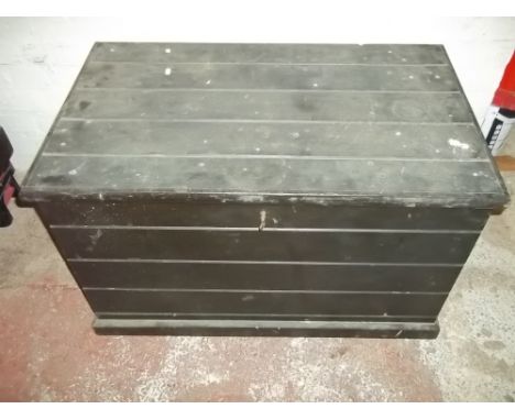 A WOODEN TRUNK