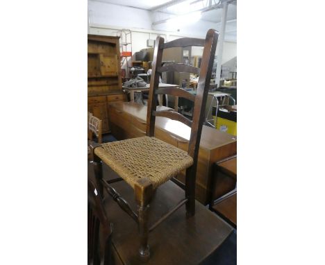 A Child's Ladder Back Rush Seated Chair 