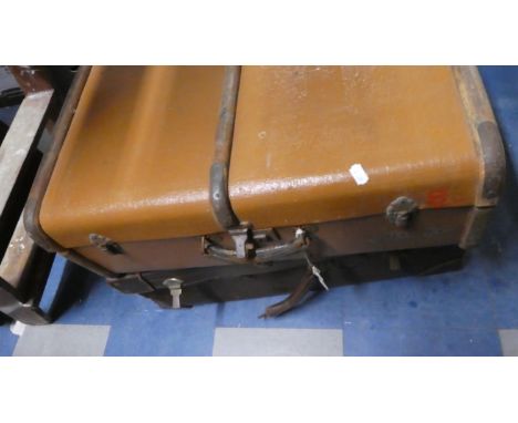 A Vintage Leather Suitcase and a Canvas and Wooden Bound Travelling Trunk 