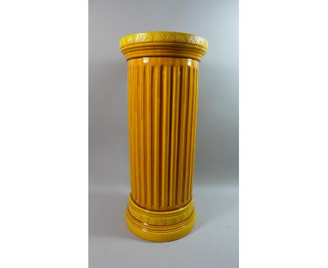 A Large Orange Glazed Ribbed Cylindrical Stoneware Stick Stand by Burmantofts, Impressed Mark to Base Burmantofts Faience 576
