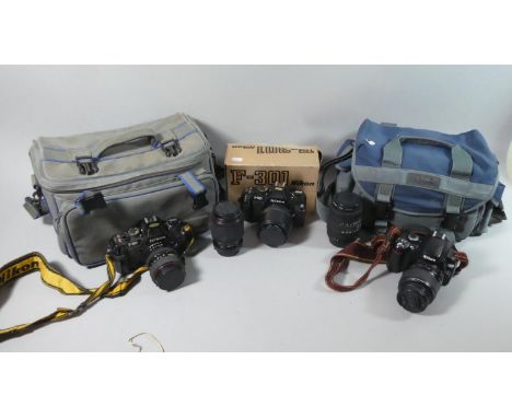 A Collection of Photographic Equipment to Include Two Nikon 35mm Cameras, F-300 and F-301 Together with a Nikon Digital Camer