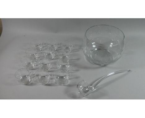 A Large Etched Glass Punch Bowl, Ladle and Twelve Matching Glasses 