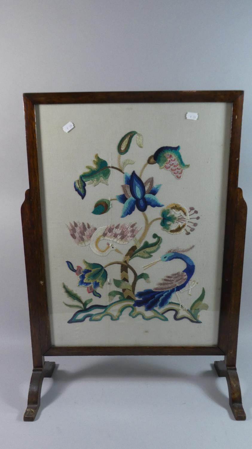 An Edwardian Silk Embroidered Oak Framed Fire Screen, 55cm Wide
