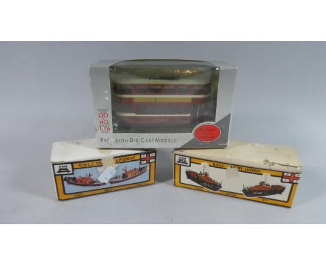 Two Cast Metal Kits for RNLI Life Boats together with a Die-Cast Model of a Tram 