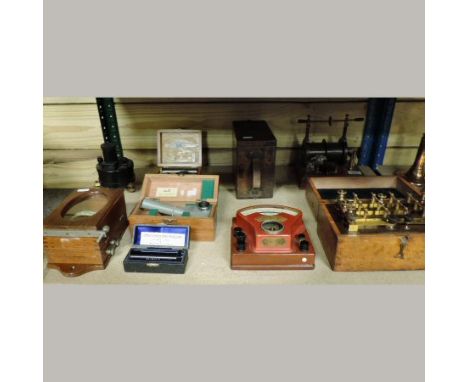 A telegraph machine, by R. W. Paul, Hatton Garden, London, boxed, together with a volt meter, boxed, a galvanometer and five 