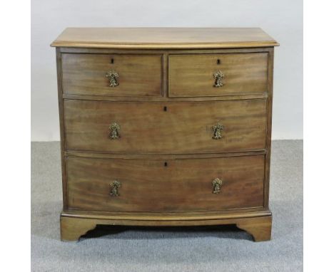 An early 20th century mahogany bow front chest, containing two short over two long drawers, on bracket feet, 92cm