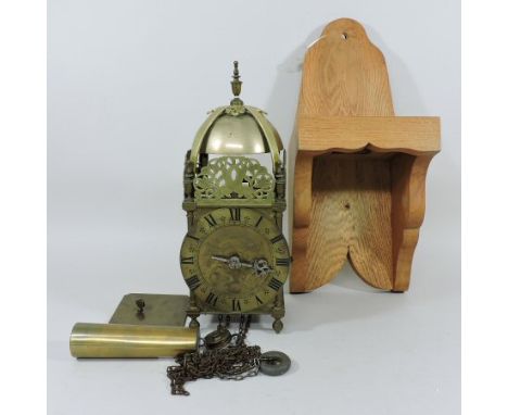 A 17th century style brass cased lantern clock, the six inch chapter ring, with roman hours, engraved William Gray, London, w