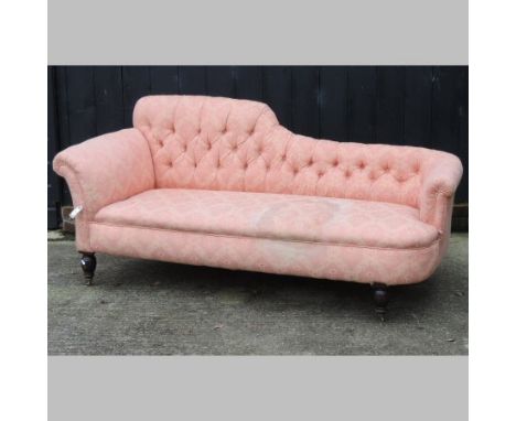 A Victorian pink upholstered button back chaise longue, 185cm