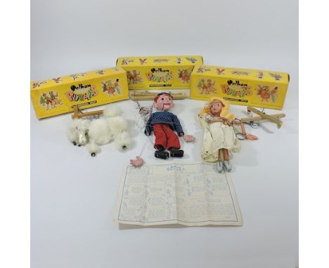 A Pelham puppet poodle, boxed, together with two others