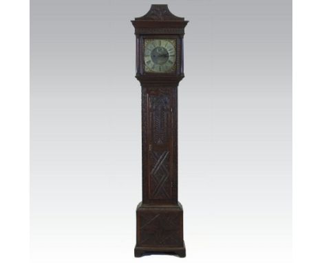 An 18th century and later carved oak cased longcase clock, the twelve inch brass dial signed William Ball, Lanton, the twin t