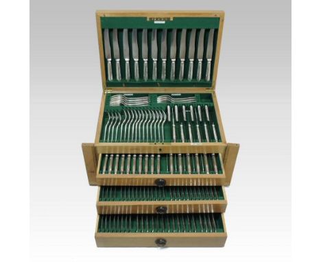 An early 20th century light oak cased canteen of cutlery, one hundred and thirty two pieces, by Walker and Hall