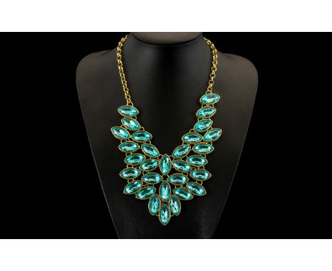 Swiss Blue Topaz Colour Crystal Large Bib Necklace, fully articulated V shaped bib of marquise shape crystals in the brillian