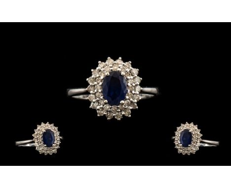 18ct White Gold - Attractive Sapphire and Diamond Set Dress Ring, Flower head Design. The Diamonds of Good Colour. Diamond We