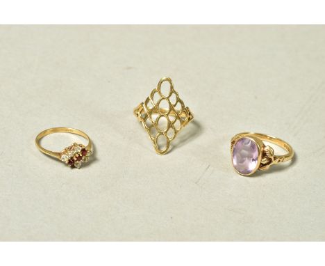 THREE RINGS, the first a 9ct gold ring with pierced diamond shape panel to the front, ring size P, the second a 9ct gold amet