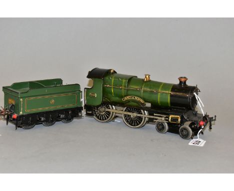 AN UNBOXED HORNBY O GAUGE CLOCKWORK No.2 SPECIAL 4-4-0 LOCOMOTIVE AND TENDER, 'County of Bedford' No.3821, G.W.R. lined green