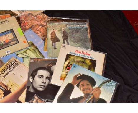 A COLLECTION OF TWENTY FOLK MUSIC LPs by artists such as Cat Stevens, Bob Dylan, Simon and Garfunkel etc ( Full list availabl