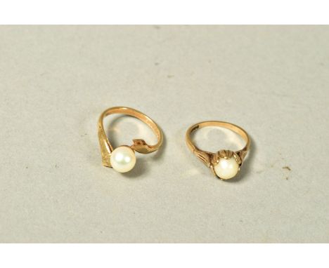 TWO 9CT GOLD CULTURED PEARL RINGS, the first a single cultured pearl in a leaf design setting, ring size M 1/2, the second a 