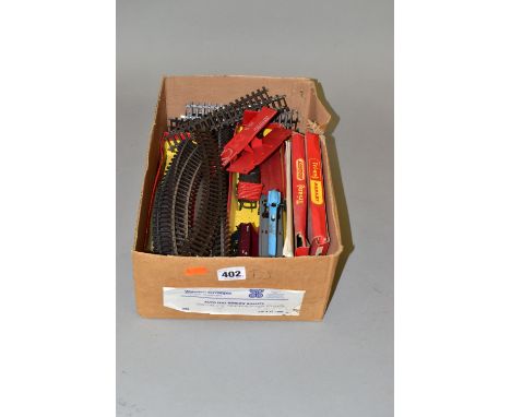 A SMALL QUANTITY OF BOXED AND UNBOXED TRI-ANG AND TRI-ANG HORNBY OO GAUGE ROLLING STOCK AND TRACK, to include unboxed Tri-ang