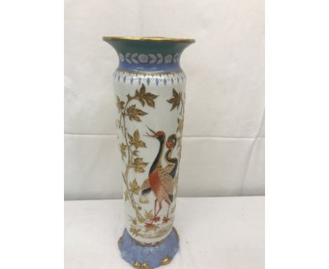 A ceramic vase depicting Oriental red-headed cranes and trees