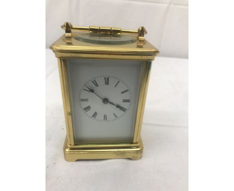 A brass carriage clock by Garrard &amp; Co