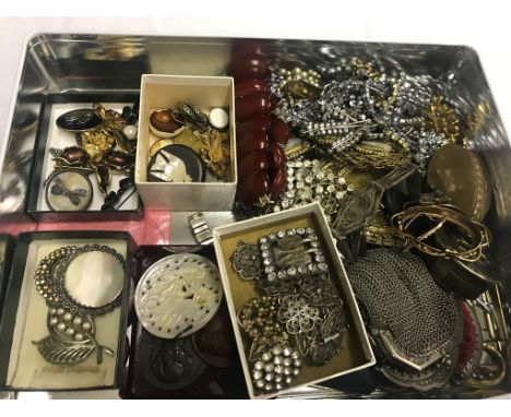 A quantity of vintage jewellery, silver brooches, diamante, beads buttons, and pewter matchstrike