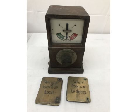A vintage railway signal indicator; together with brass plaques