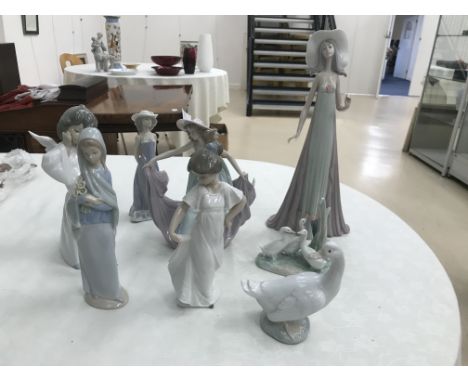 A quantity of Lladro and Nao figures