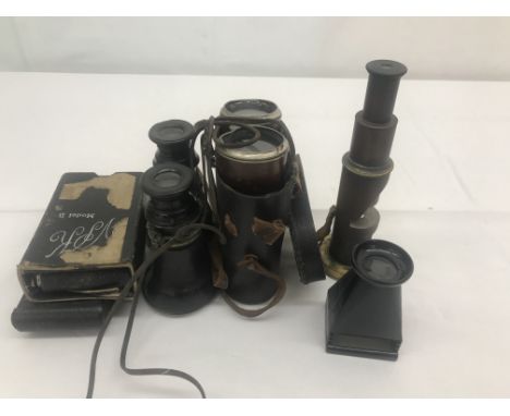 A quantity of vintage cameras and binoculars; together with a microscope