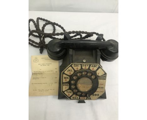 A 1950's vintage bakelite telephone and 1959 introduction of 100 operator services