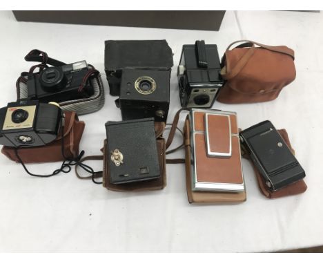 A quantity of cameras to inc Polaroid