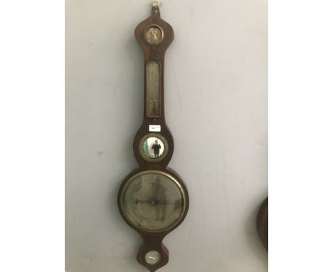 A Georgian banjo onion-topped barometer