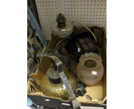 A box containing light fittings, various together with a brass oil lamp