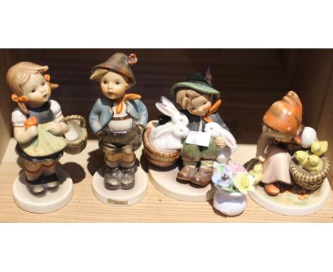 A collection of Goebel /Hummel figurines of children Condition: girl with chicks: grazing to base, boy with rabbits: very tin