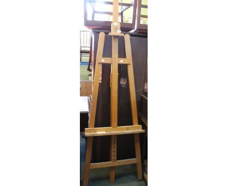 A substantial wooden artist easel