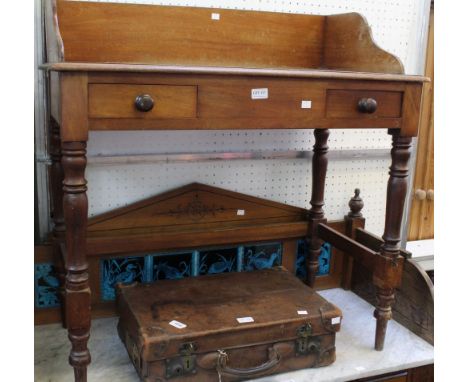 A compact two drawer mahogany wash stand