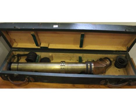 A brass sighting scope, Mk 4, by W Ottaway of London 1955, in original painted wood box, 80cm together with a metal ammunitio