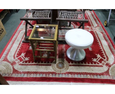 A Chinese carved design floor carpet on a crimson ground 246 x 310 cm