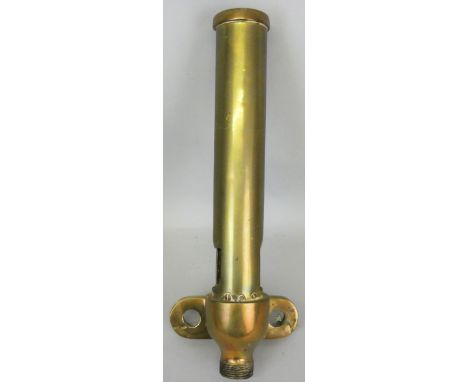 A brass locomotive whistle (hooter), complete with pipe mounting flange, length 39cm.