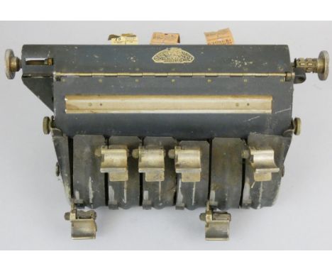 A Solomatic 'Control Systems Limited' ticket machine, with pence tickets and partial rolls for Leicester City Bus.